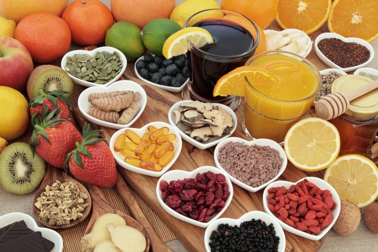 Superfoods for immunity collected in separate heart-shaped bowls.